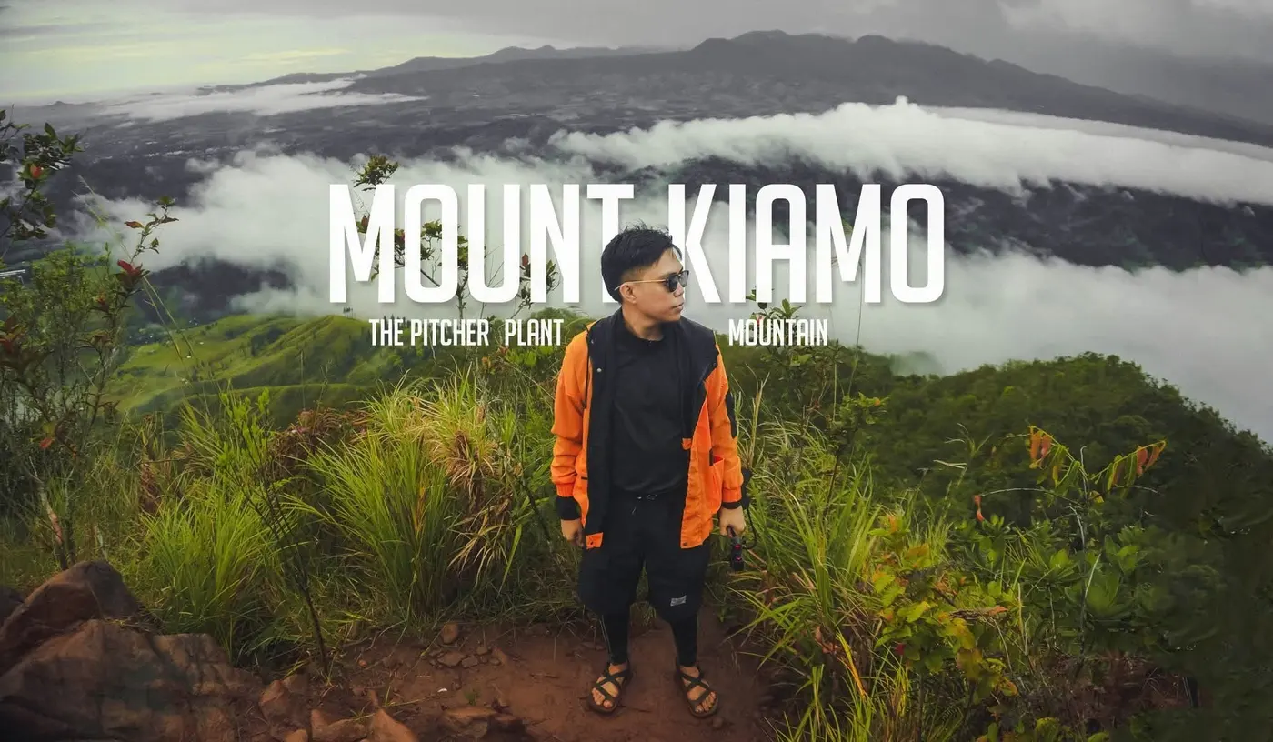 Hiker in an orange jacket on Mt. Kiamo, the pitcher plant mountain